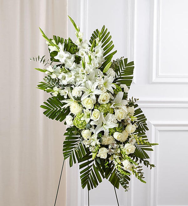 white and green flowers on a vertical stand
